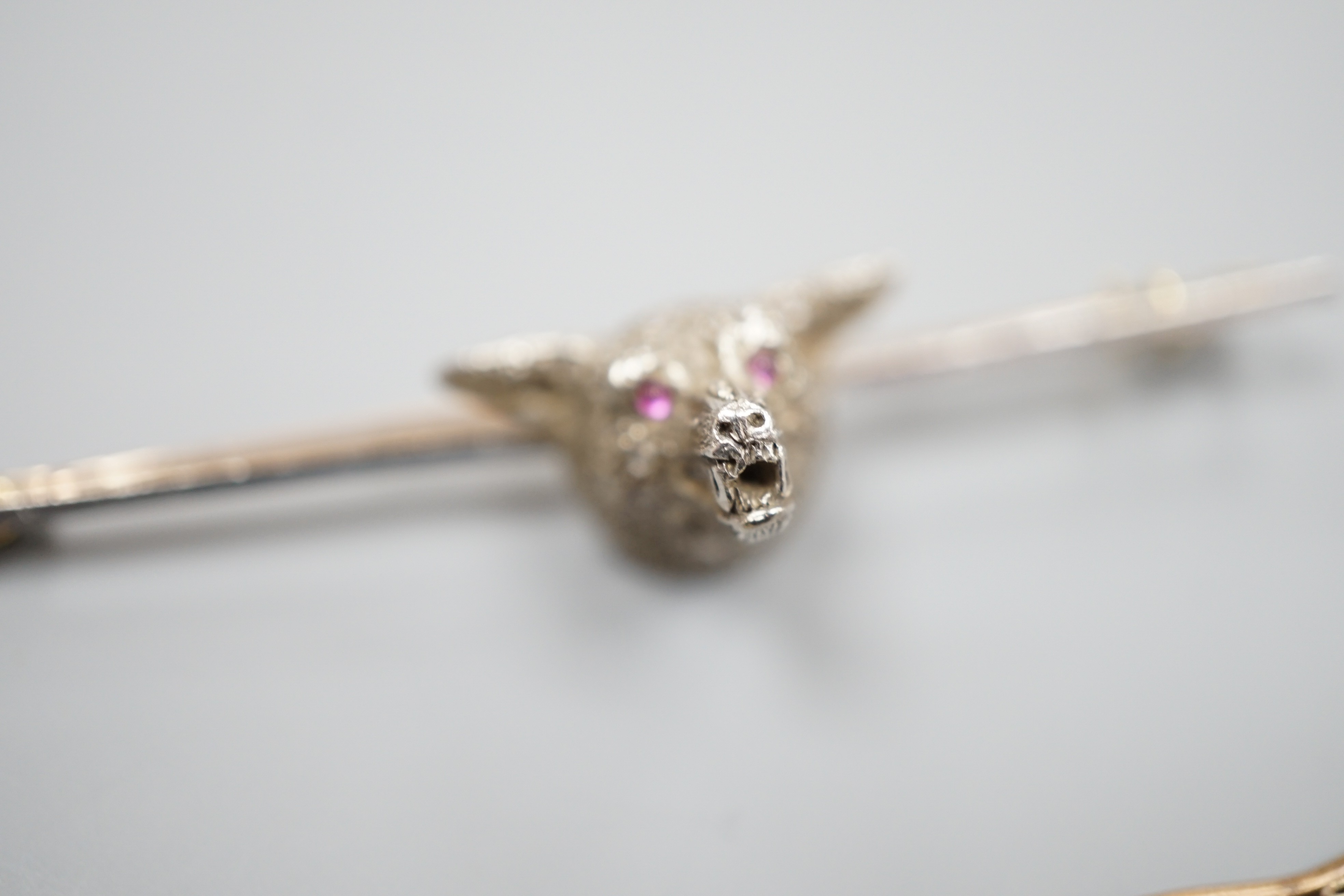 A yellow and white metal, rose cut diamond set fox head bar brooch, 62mm and a yellow metal, rose cut diamond and turquoise set bar brooch, gross weight 11.6 grams.